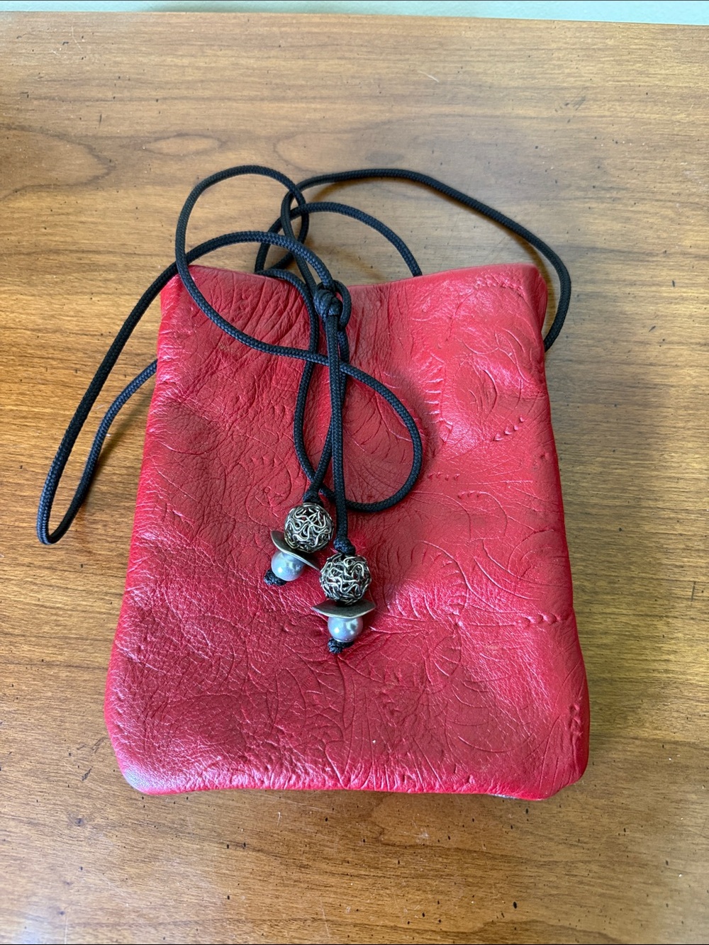 Red Leather Drawstring Pouch with Beaded Accents